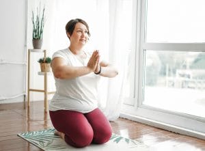 adult woman practicing yoga